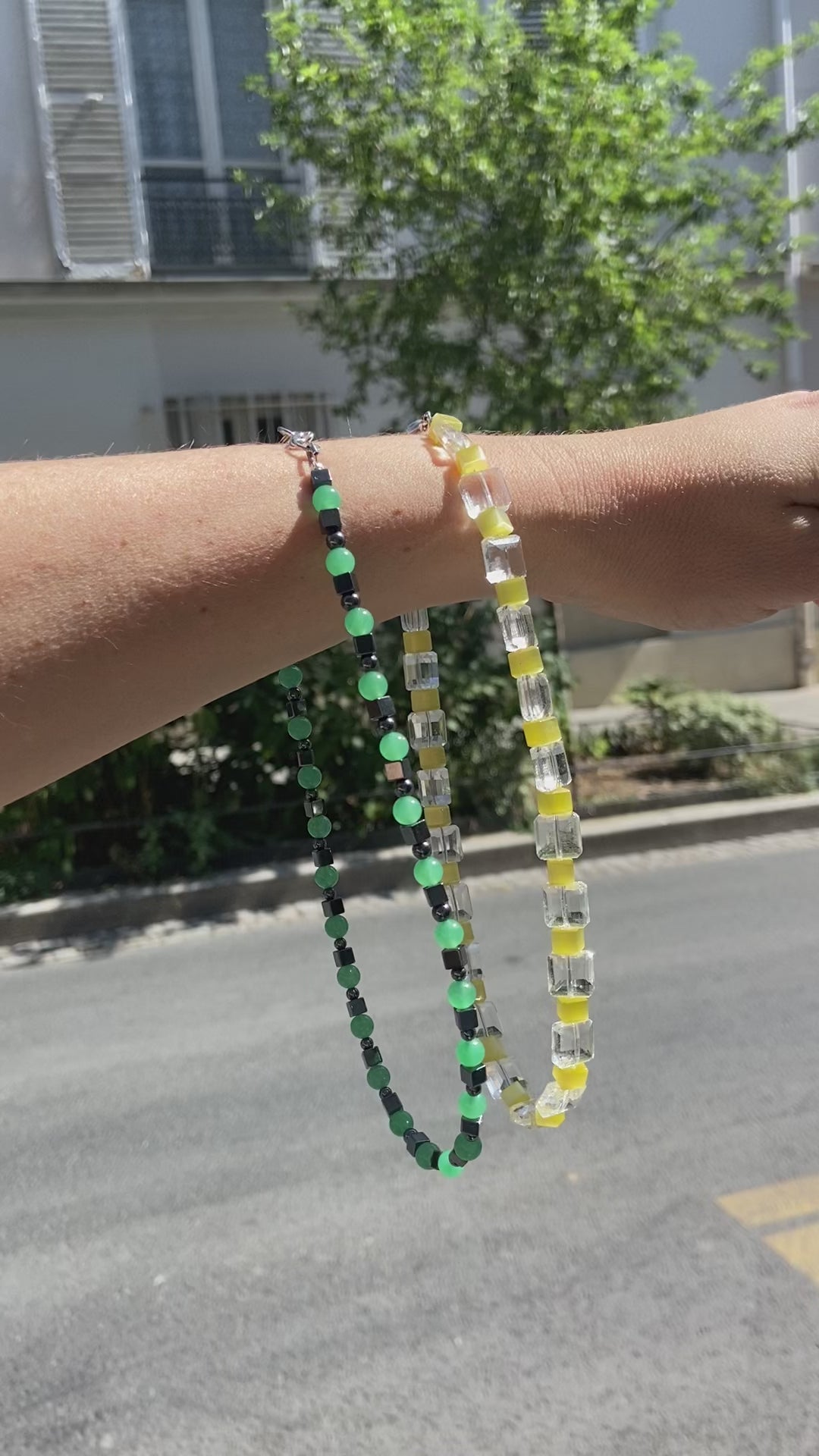 handmade beaded necklaces (made of glass and natural stones) shinning with sun light